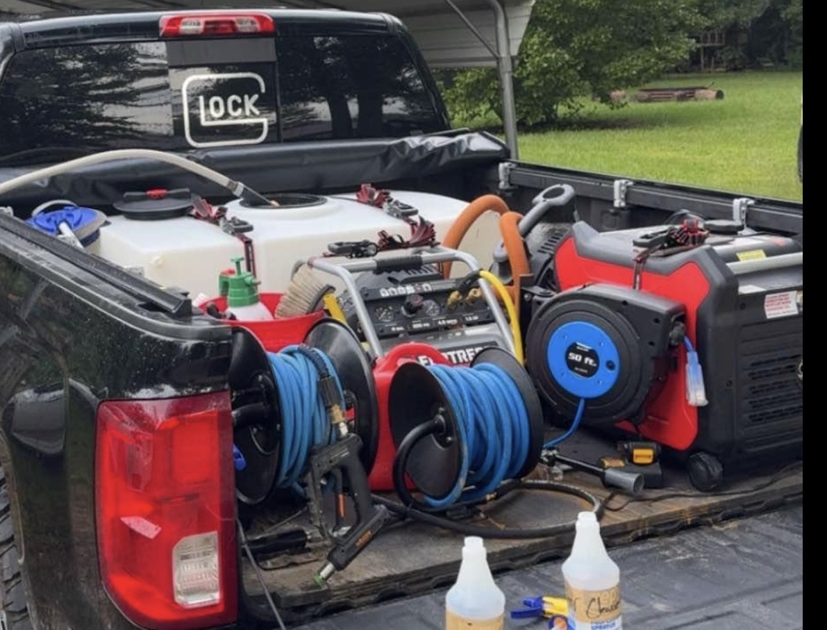 Gulf Gloss mobile detailing setup with onboard water, hoses, compressor, and generator